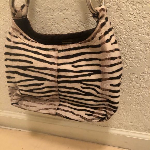 prada tiger bag